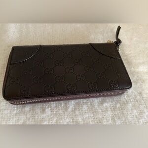 Gucci Dark Brown GG Embossed Wallet leather